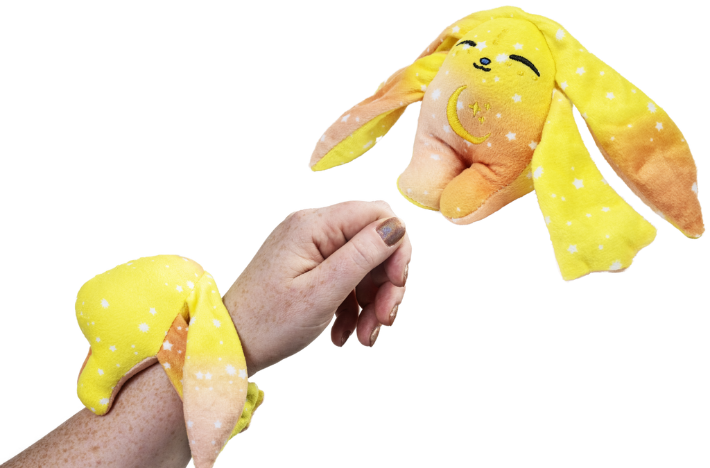 Spark Mini Wrist Hugger, a small yellow Moon Pals wrist plush