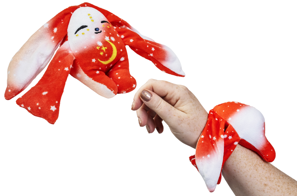 Rover Mini Wrist Hugger, a small red Moon Pals wrist plush