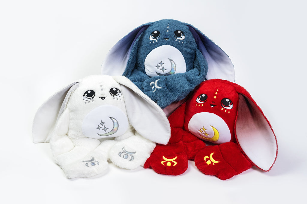 Group of Moon Pals weighted plush