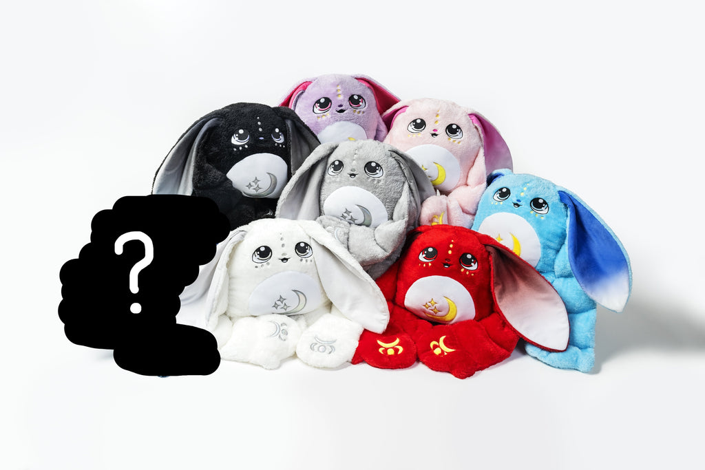 Group of Moon Pals weighted plush