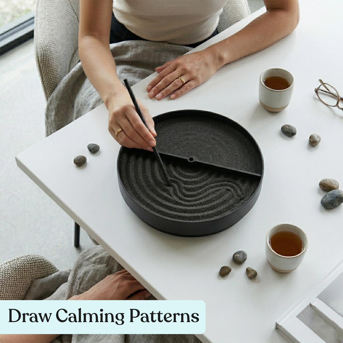 Raking patterns in the zen garden sand spinner