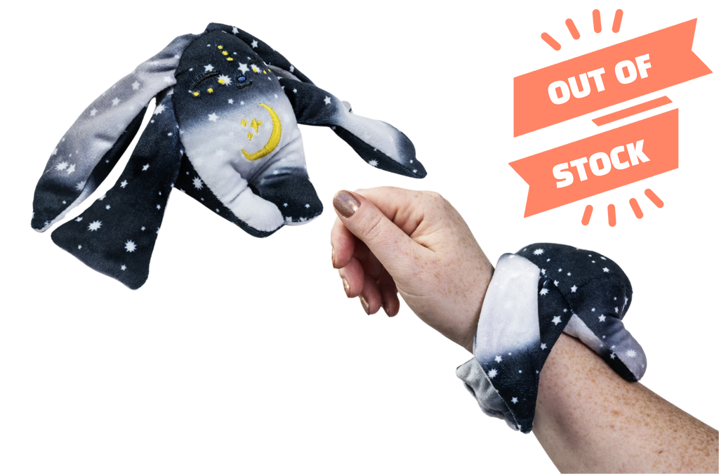 Zero Mini Wrist Hugger, a small white Moon Pals wrist plush