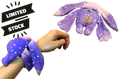 Polli Mini Wrist Hugger, a small purple Moon Pals wrist plush