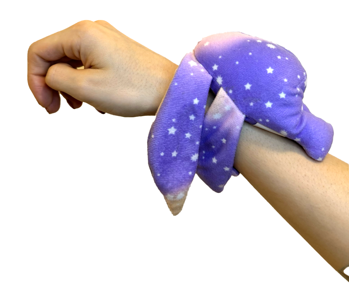 Purple Polli Mini Wrist Hugger worn on an arm